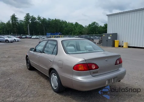 2001 Toyota Corolla Le from USA, damaged, VIN 2T1BR12E01C399979